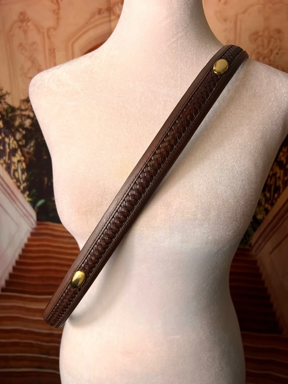 Izod Unique vintage genuine leather belt features a classic brown leather strap